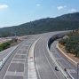 Explore a pristine highway surrounded by lush hills in Küçükkuyu, Turkey.